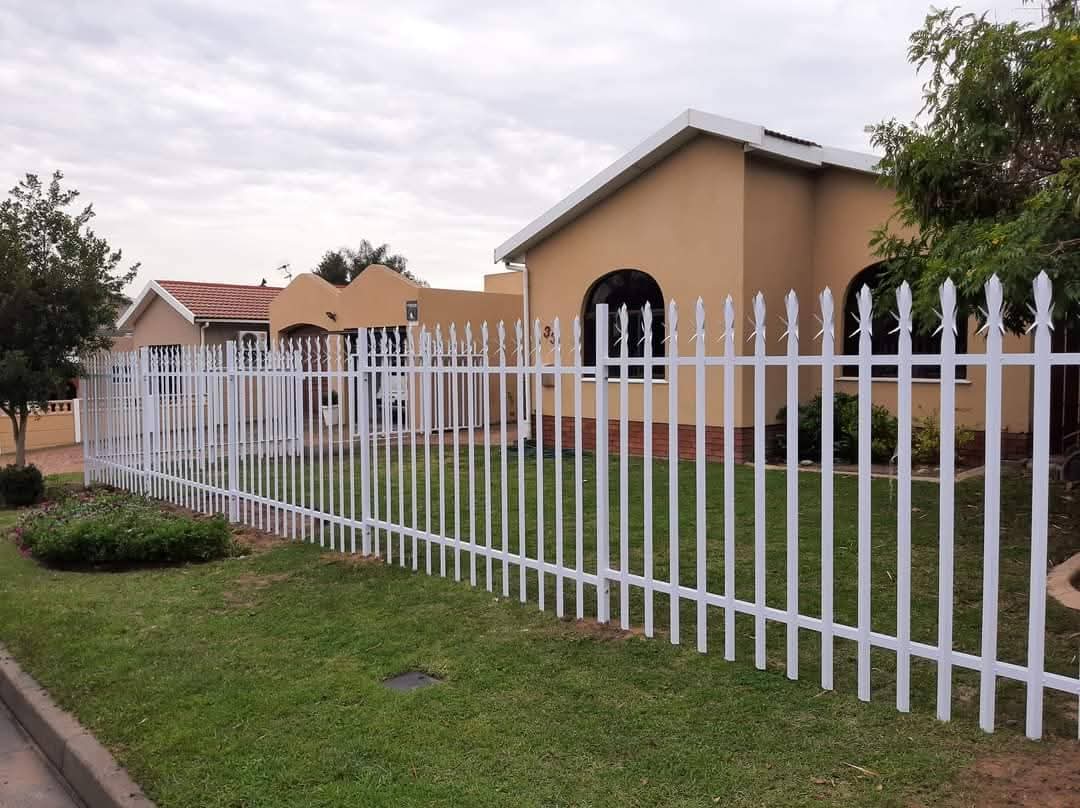 White steel palisade security fencing for a residential property in Durban